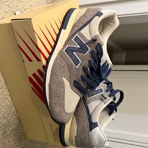 New Balance Cream and Navy Sneakers
